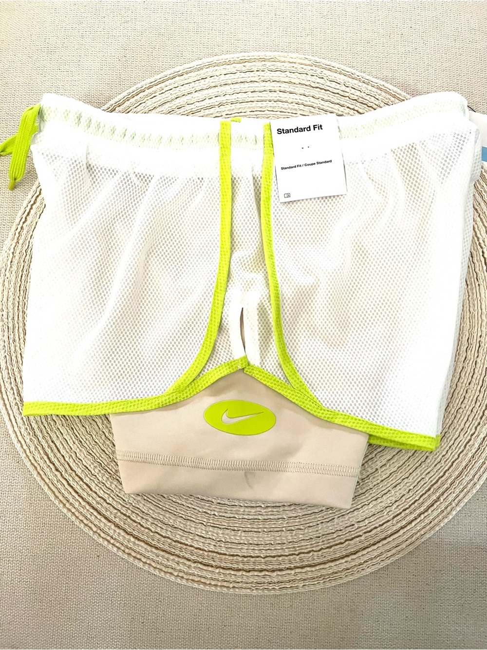 Nike Beige Sports Shorts with White Mesh Overlay and Neon Green Trim
